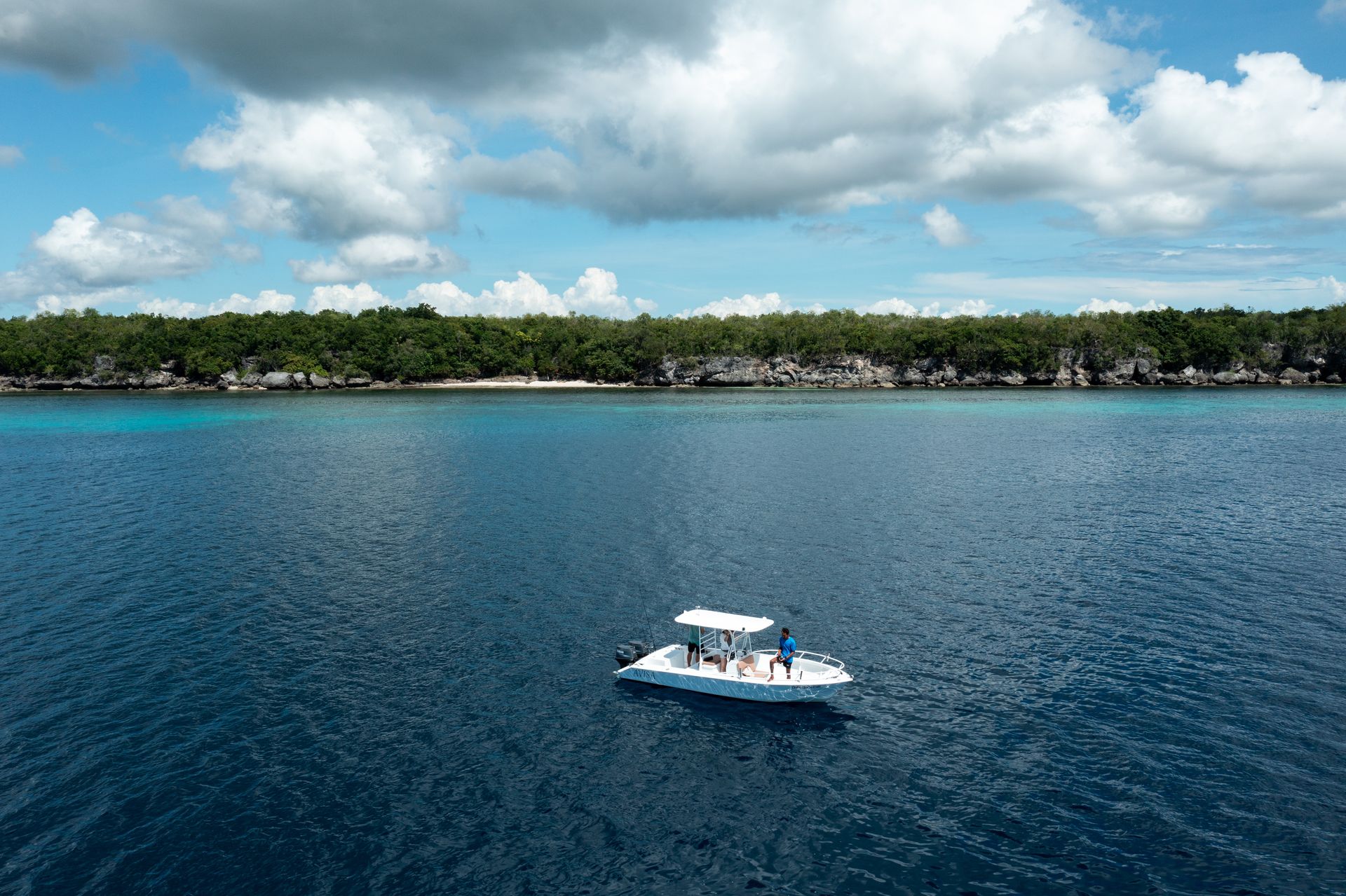 Saltie’s fishing boat on the clear sea off Bohol